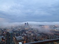 Mist at dawn over east-end Toronto from Spire
